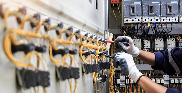 Professional Electrician technician working in East Alton, IL